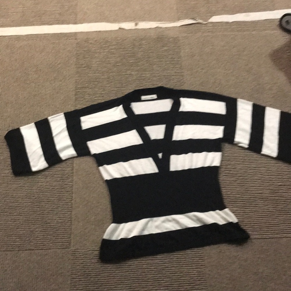 Black and white striped V-neck sweater